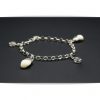 Pulsera de plata con perlas de ciervo y balas