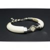 Pulsera de colmillos con marfil